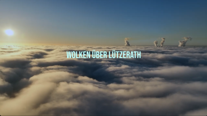 Foto vom Video Position über den Wolken. Text Wolken über Lützerath